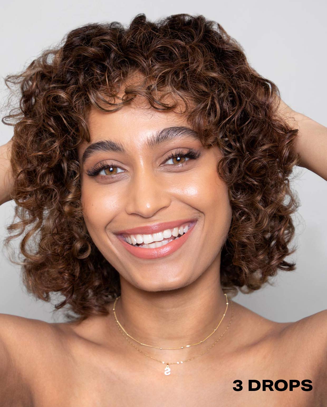 DROP IT WARM BROWN TONER ON MODEL USING THREE DROPS