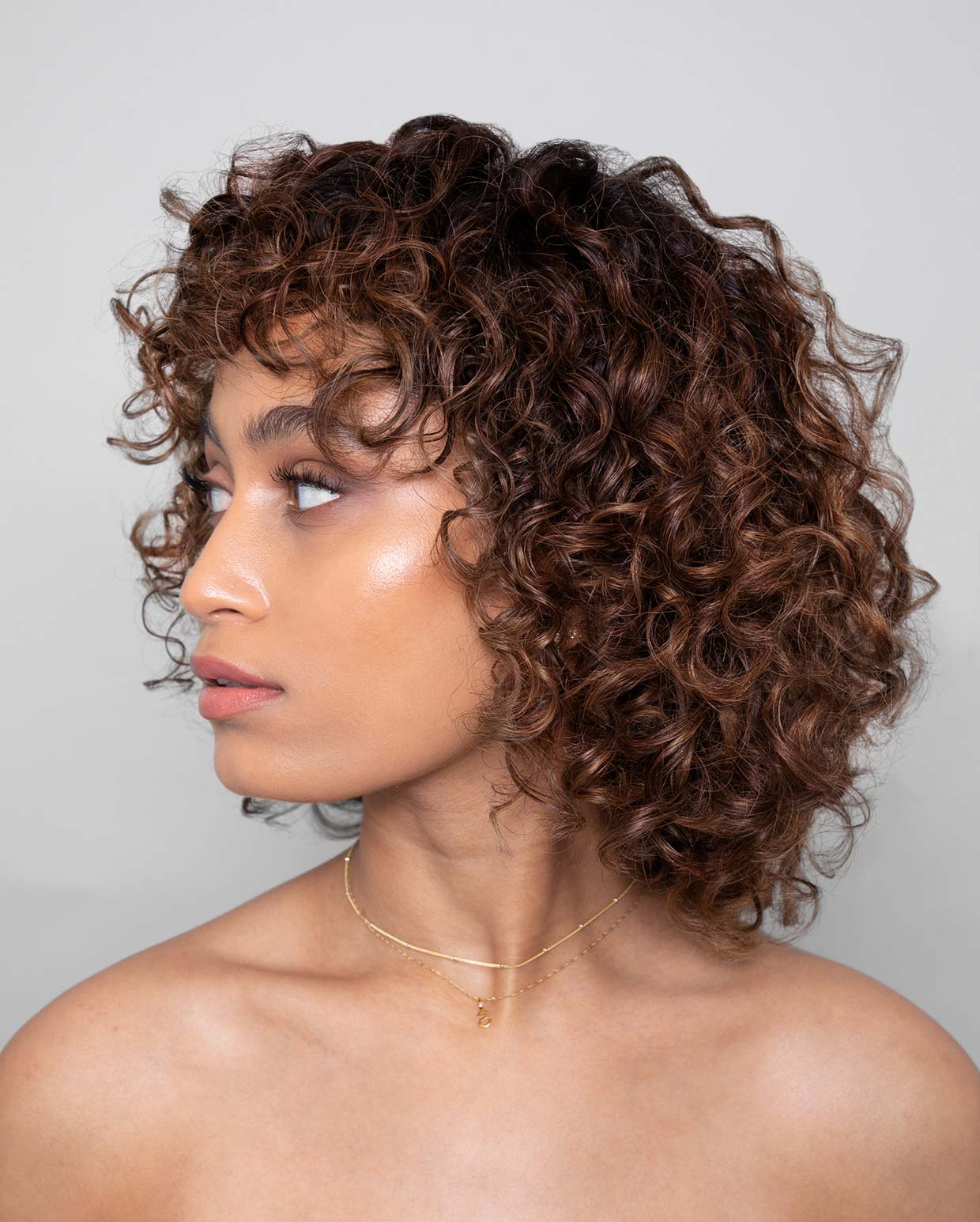 DROP IT WARM BRUNETTE TONER ON MODEL SIDE PROFILE