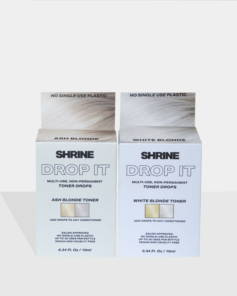 Two boxes of the Shrine Drop it Ash Blonde Toner and the White Blonde Toner combined to make the Blonde for days box